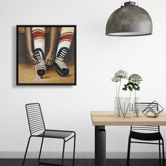 Hockey Player Ties Skates Framed Canvas | Sports Home Decor