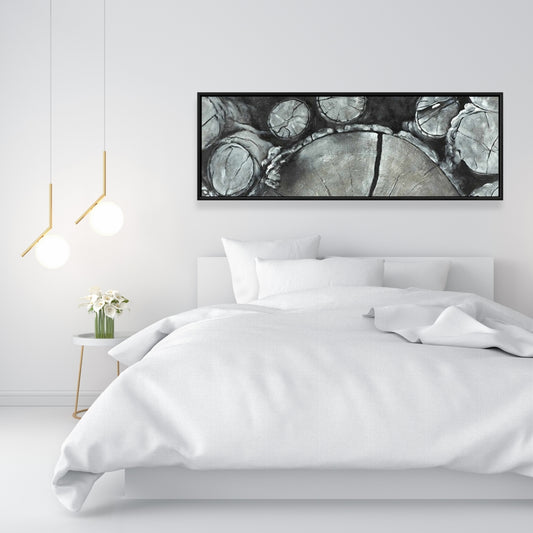 Toile « Bûches de bois empilées » | Décor monochrome avec cadre blanc