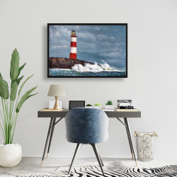 Framed 24 x 36 - Lighthouse at the edge of the sea unleashed