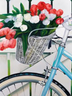 Bicycle with tulips flowers in basket