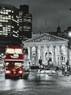 Grayscale pantheon with red bus