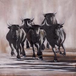 Group of running bulls