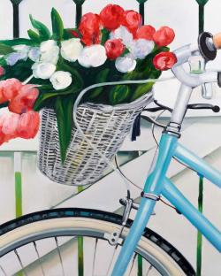 Bicycle with tulips flowers in basket