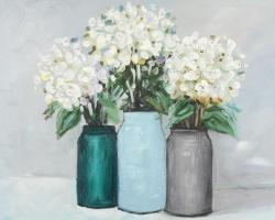 Hydrangea flowers in blue vases