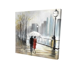 Couple walking under the rain