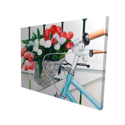 Bicycle with tulips flowers in basket