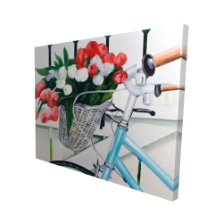 Bicycle with tulips flowers in basket