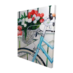 Bicycle with tulips flowers in basket