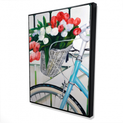 Bicycle with tulips flowers in basket