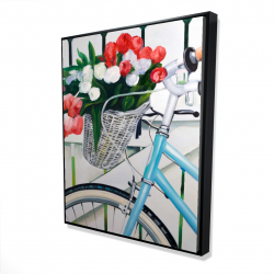 Bicycle with tulips flowers in basket