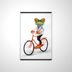 Funny frog riding a bike