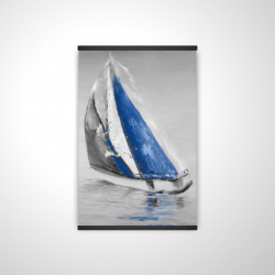 Gray and blue boat sailing