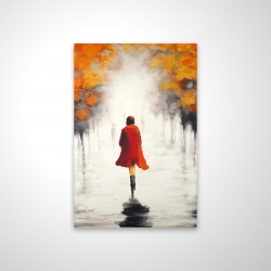 Woman with a red coat by fall